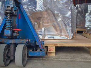 Packed goods on top of palette loaded in an isolated lift truck